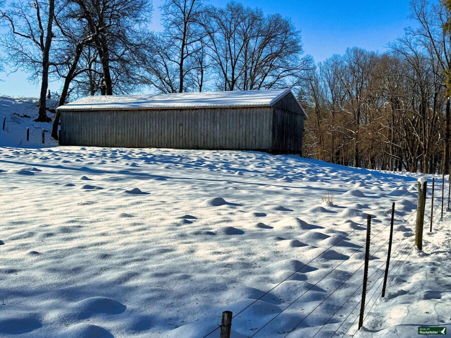 A barn in the snow.