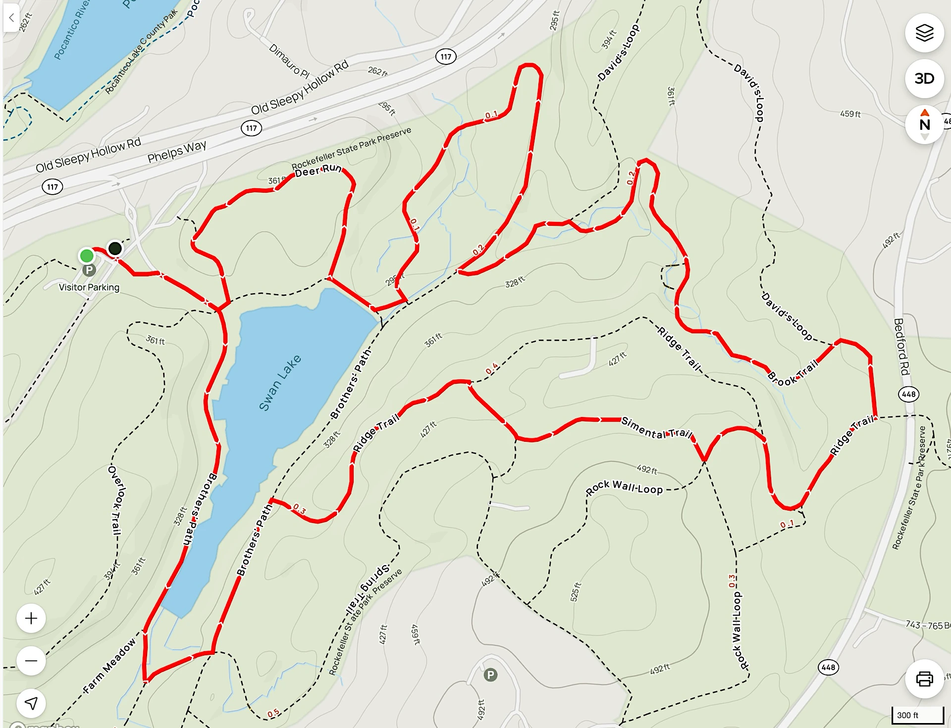Shady Hike 2 at Rockefeller State Park Preserve1920 A trail map shows a red-marked hiking route looping around Swan Lake and nearby forest paths in a park, with labels for paths, elevation lines, and parking.