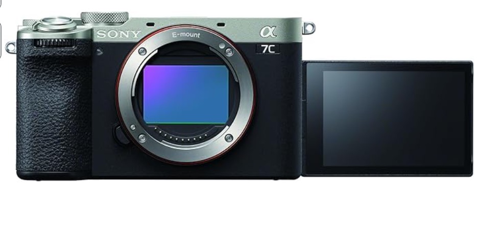 Sony a7cii Front view of a Sony Alpha 7C digital camera with the lens removed, showing the sensor and a flipped-out LCD screen.